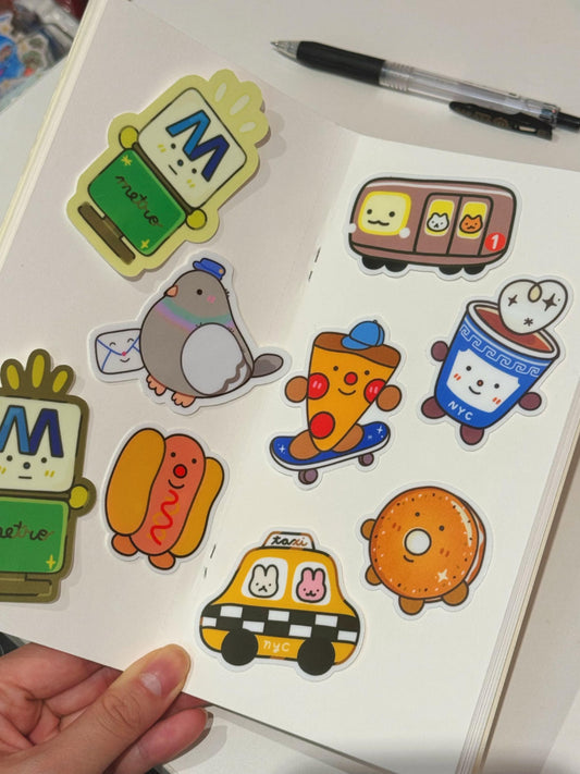 NYC Vinyl Sticker Bundle Deal | 9 Cute New York City Stickers| MTA Pigeon Subway Pizza Taxi Bagel Coffee Pizza Train Lamp | Waterproof Matte